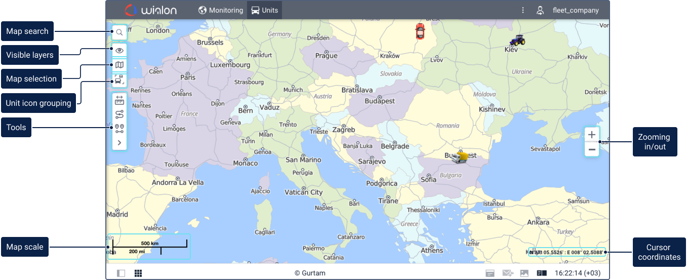 Wialon map view with unit icons, and the map search, visible layers, map selection, unit icon grouping, tools, map scale, zooming, and cursor coordinates elements labeled