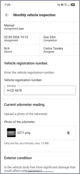 Assigned form open with questions to answer, including a text field and a file upload